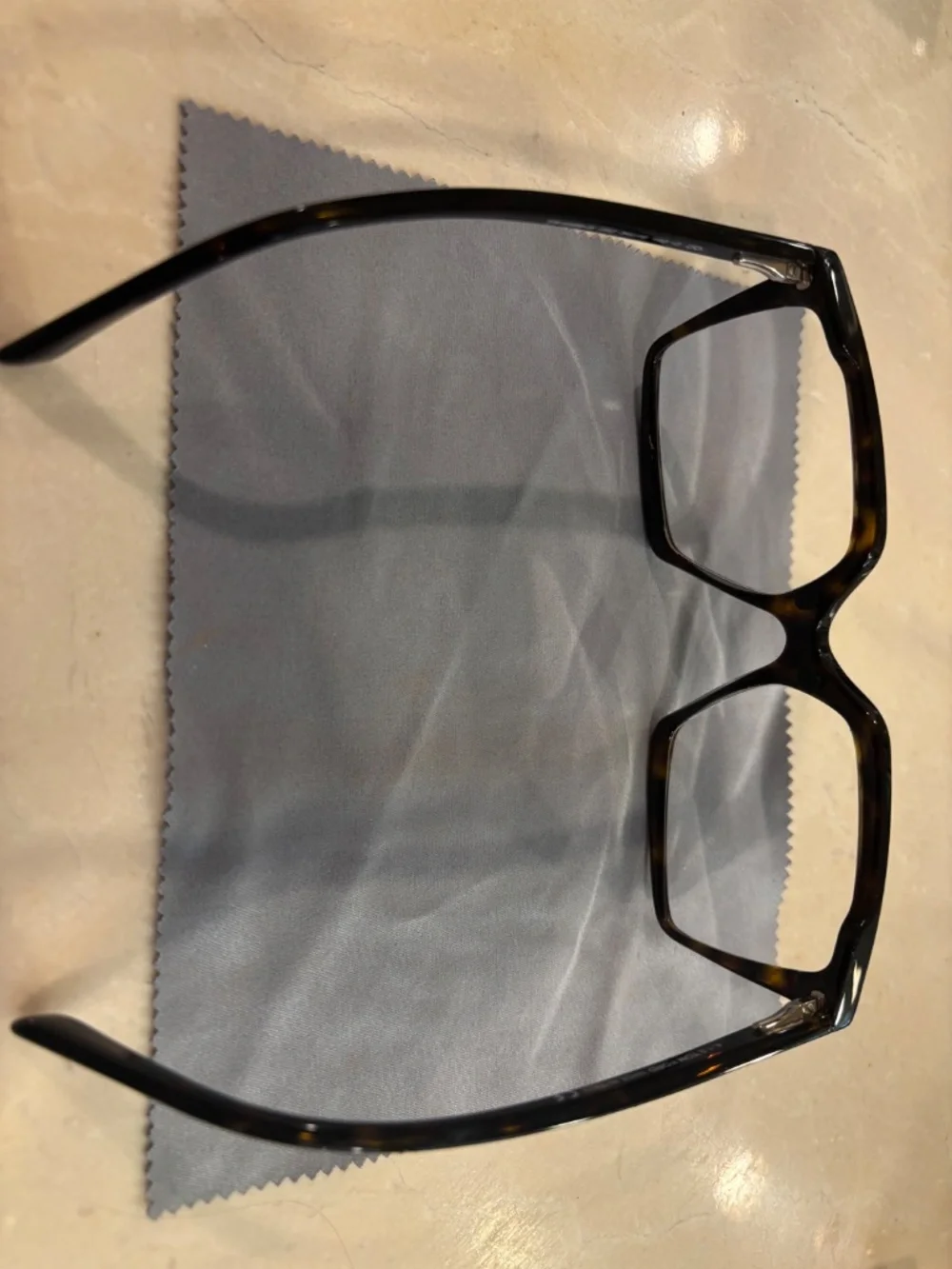 Lot of used Prada and Tom Ford glasses.